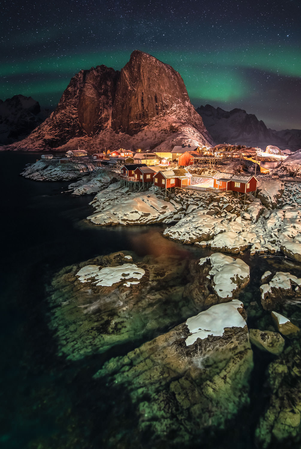 Northern Lights over the fishing village Hamnøy in Norway